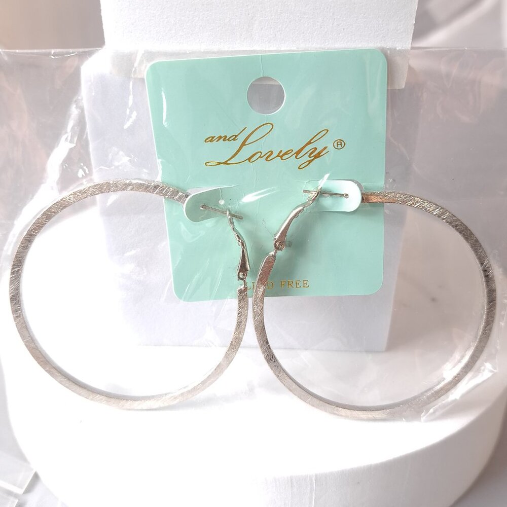 And Lovely Large Silver Hoop Earrings